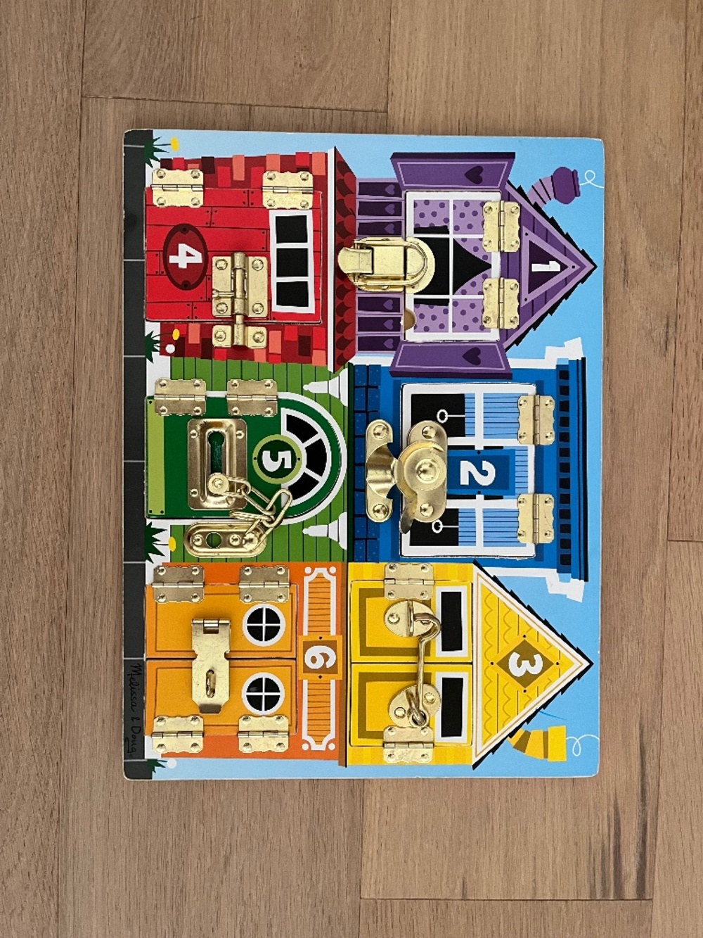 Like New - Melissa & Doug Latches Wooden Activity Board